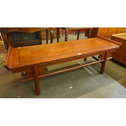 123 - A Chinese hardwood coffee table