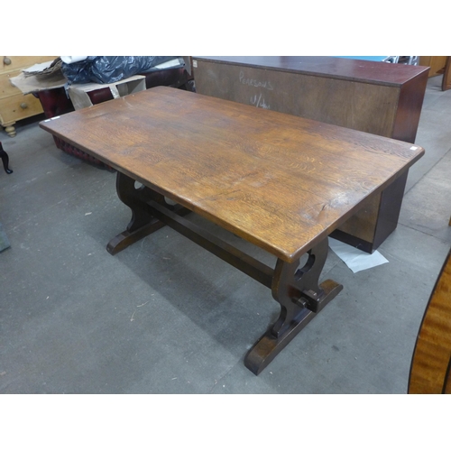 139 - An oak refectory table