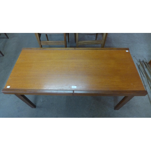 14 - A teak coffee table