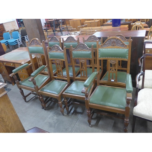 146 - A set of eight Arts and Crafts oak dining chairs