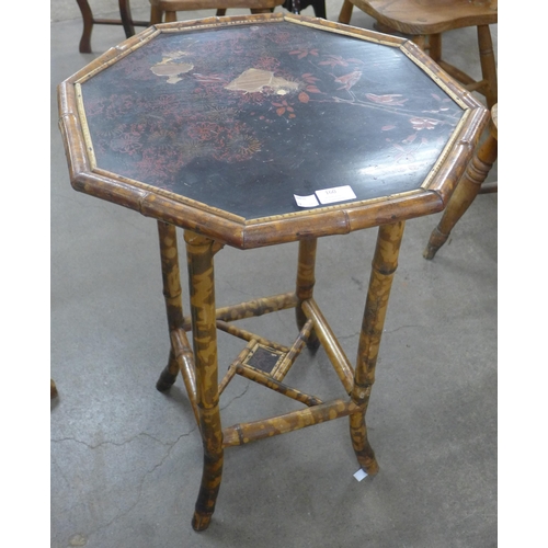 160 - A Victorian Aesthetic Movement bamboo and black lacquered occasional table