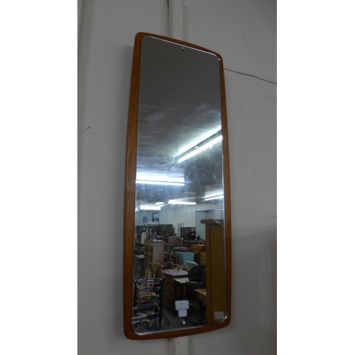 20 - A Danish teak rectangular framed mirror