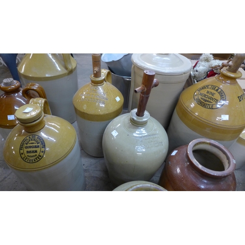 279 - A large quantity of assorted stoneware flagons, jars, etc., includes Cheavins filter, chip on lid, 5... 