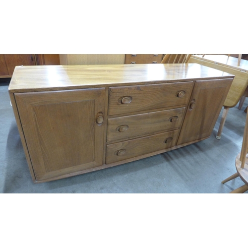 28 - An Ercol Blonde elm Windsor sideboard