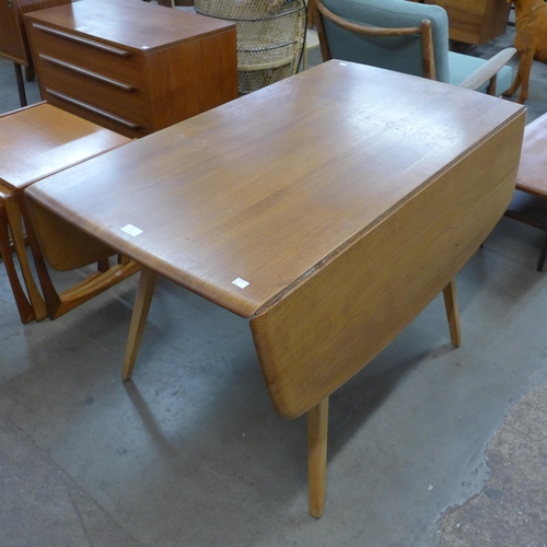 33 - An Ercol Blonde elm and beech Windsor drop-leaf table