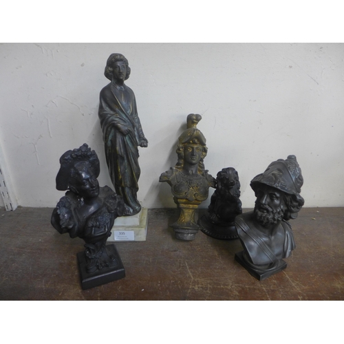 335 - A French Art Nouveau bronze bust of a lady, a cast iron figure of a lady, a cast iron lion and two s... 