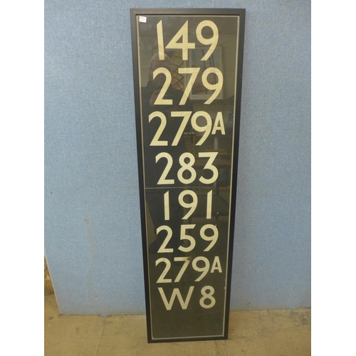 342 - A framed section of London bus destination number roll