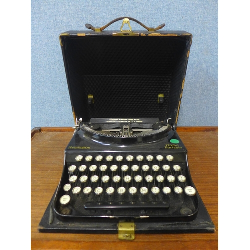 355 - A vintage cased Remington Home Portable typewriter