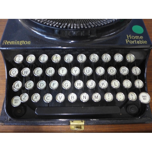 355 - A vintage cased Remington Home Portable typewriter