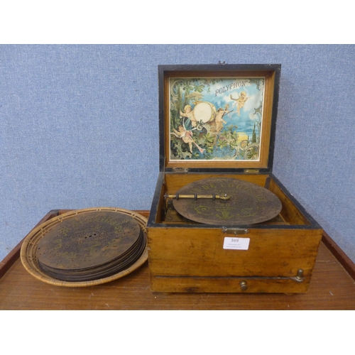 369 - A 19th Century Swiss walnut cased Polyphon music box, with additional discs