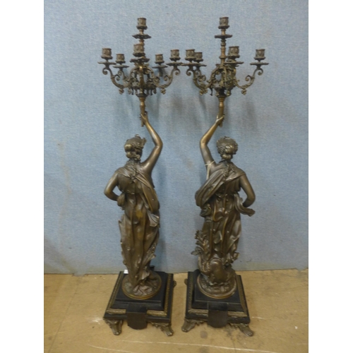 373 - A pair of large French style bronze figural candelabrum