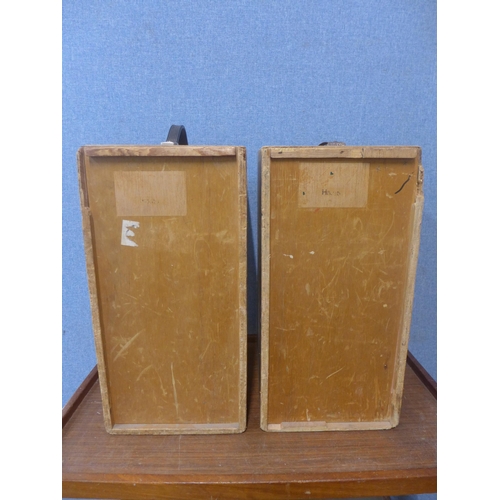 382 - Two cased Elizabethan figures