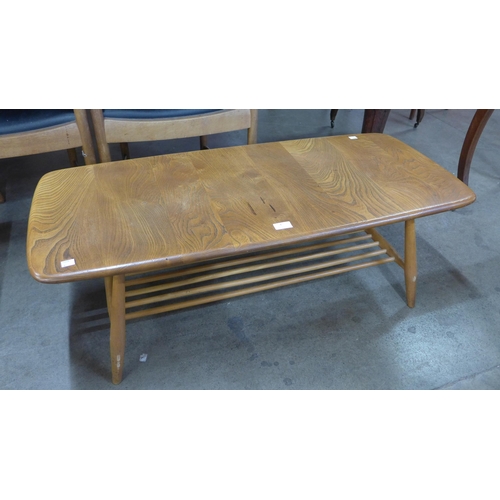 4 - An Ercol Blonde elm and beech 459 model Windsor coffee table