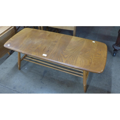 4 - An Ercol Blonde elm and beech 459 model Windsor coffee table