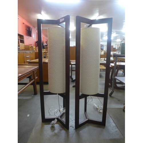 41 - A pair of teak effect floor standing lamps