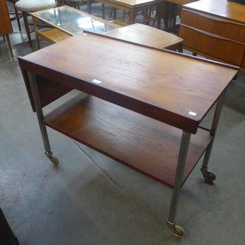 51 - A teak. chrome and white laminate drop leaf cocktail trolley