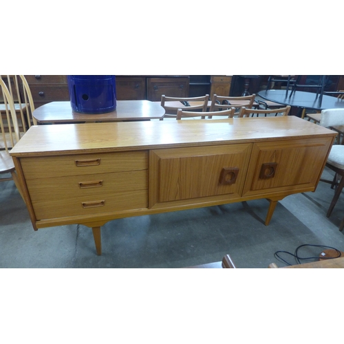 64 - A teak sideboard