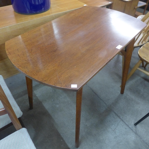 79 - A teak side table