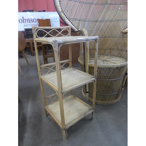 85 - A bamboo peacock chair and a two tier whatnot