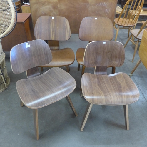 86 - Four Eames style simulated rosewood bent plywood chairs