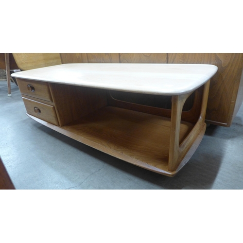 90 - An Ercol Blonde elm Windsor coffee table