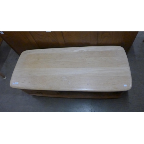 90 - An Ercol Blonde elm Windsor coffee table