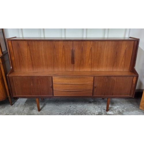 22 - A Danish teak tambour front sideboard