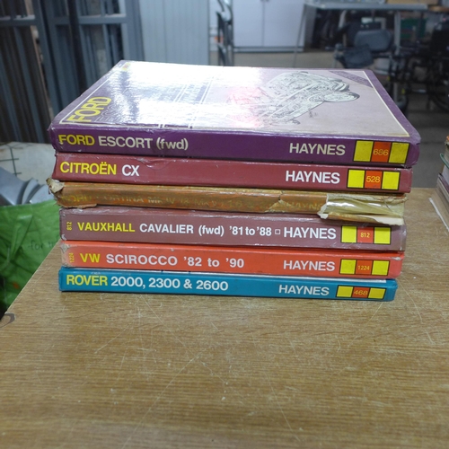 2502 - A collection of car manuals including Haynes