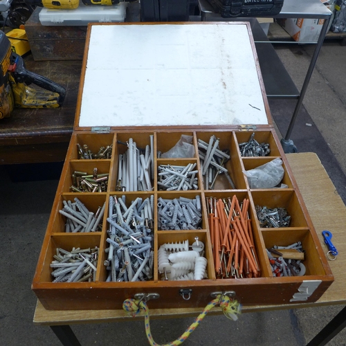 2038 - A carpenters tool box of assorted screws and fixings