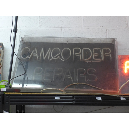 2058 - Two vintage neon shop signs