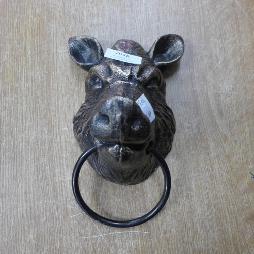 2078 - A boar's head with metal ring * this lot is subject to VAT