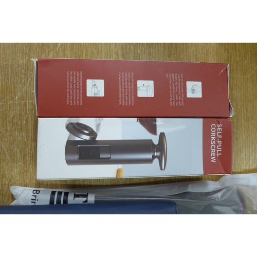 2083 - 2 Self-pull corkscrews, 2 Universal TV remote controls and 2 tablet PC cases - all sealed