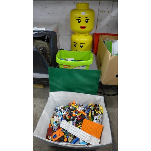 2101 - A quantity of Lego including two Lego storage heads