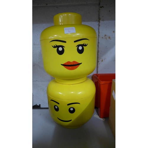 2101 - A quantity of Lego including two Lego storage heads