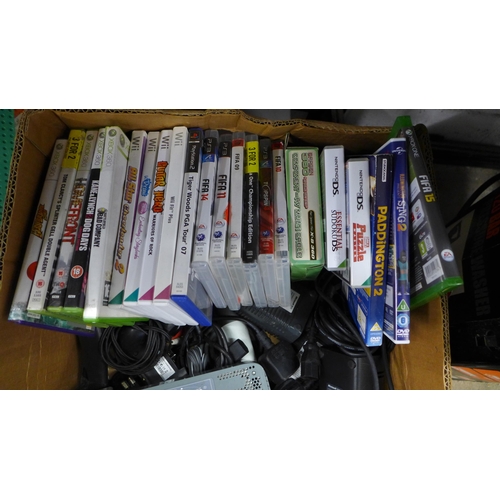 2102 - A box of assorted gaming equipment:- games, remotes and accesories