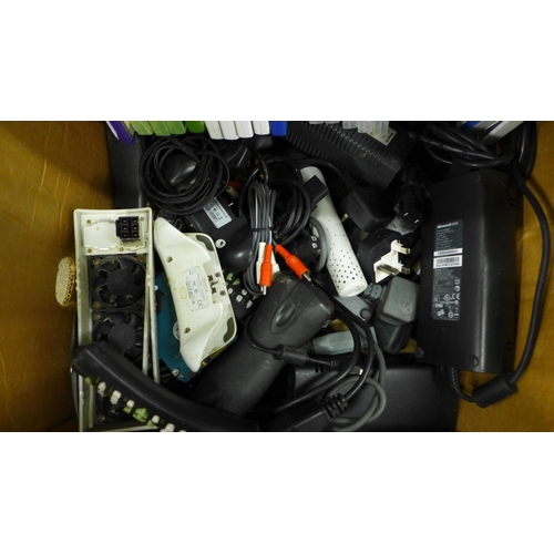 2102 - A box of assorted gaming equipment:- games, remotes and accesories