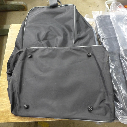 2114 - 4 Quadra holdall bags in black polyester - unused