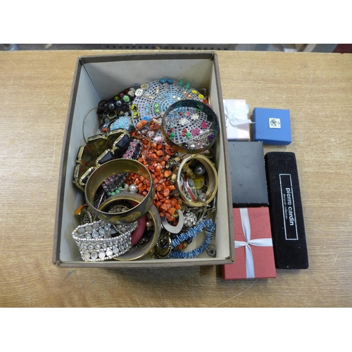 2129 - A box of costume jewellery