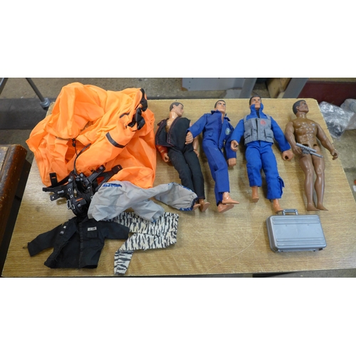 2131 - Four Action Man dolls with clothes