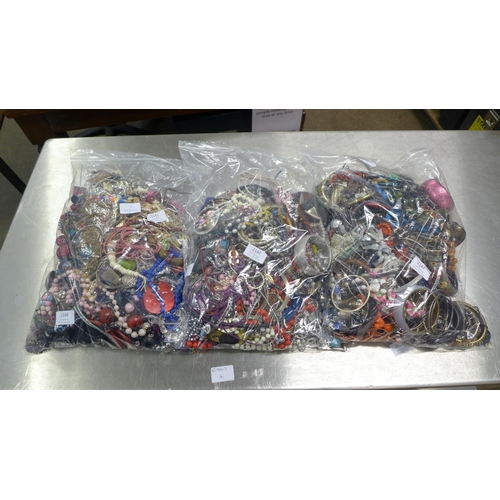 2148 - 3 Large bags  of costume jewellery