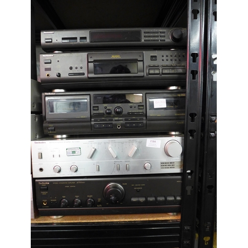 2184 - A quantity of Technics stereo seperates:- stereo synthisiser (ST-GT350), CD player (SL-P5670D), ster... 