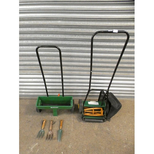 2344 - A hand cylinder mower, a lawn feeder/seed spreader, two gardening forks and a garden trowel