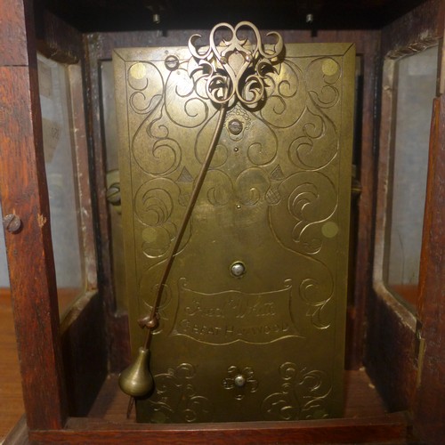 350 - An oak cased fusee bracket clock, the brass back plate signed Fred White, Great Haywood