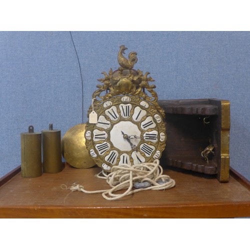 388 - A 19th Century French gilt metal comptoise wall clock