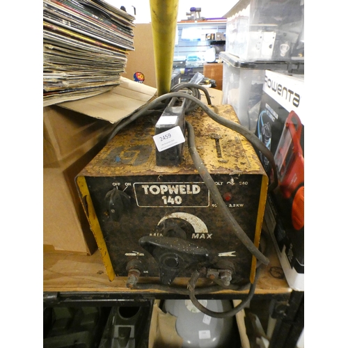 2459 - A Topweld 140 240v Sip arc welder with a quantity of brass welding rods and operating instructions