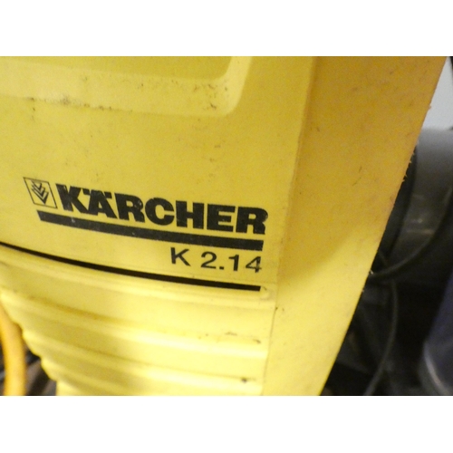 2480 - A Karcher k2.44 pressure washer and Hozelock hose pipe and reel