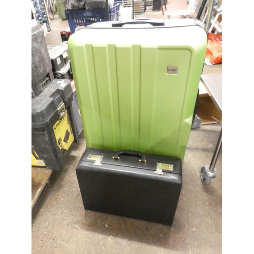 2542 - A large green plastic luggage case and a black leather briefcase with double combination lock