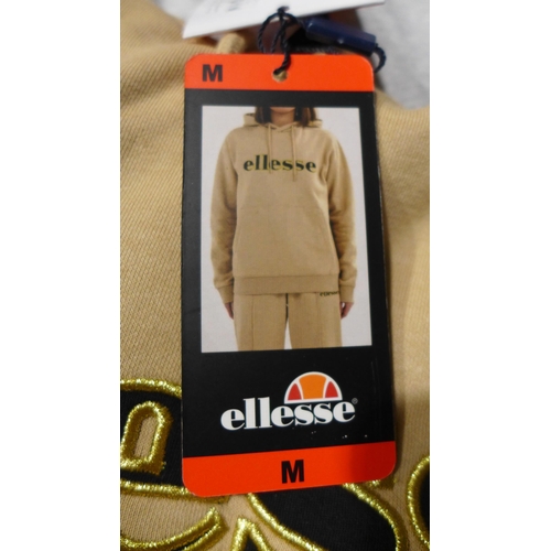 3293 - Quantitiy of branded sports clothing including Ellesse, Fila, Orvis, Levi, etc. - mixed styles/sizes... 