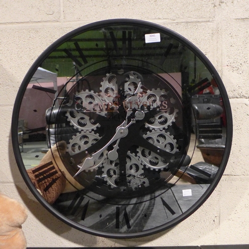 3041 - A mirrored skeleton Black circular wall clock - 