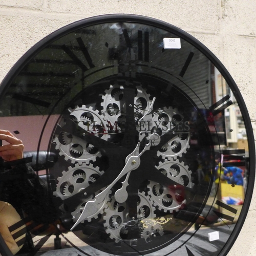 3041 - A mirrored skeleton Black circular wall clock - 